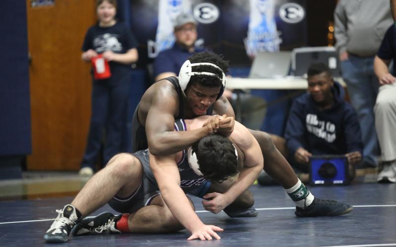 Kingston McIntosh controls his opponent's head during the Inferno Invitational Jan. 25. (Photo by Wells)