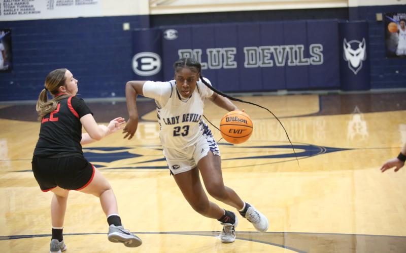 Zy Belcher drives past a Rabun defender from the top of the key during Elbert's win over Rabun County Jan. 27. (Photo by Wells)
