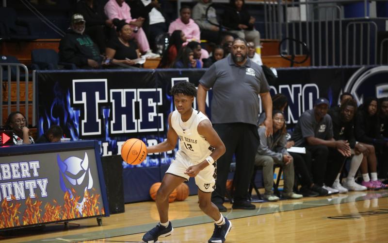 D.K. Winn crosses mid-court with the ball during a game against Rabun County Jan. 27. (Photo by Wells)