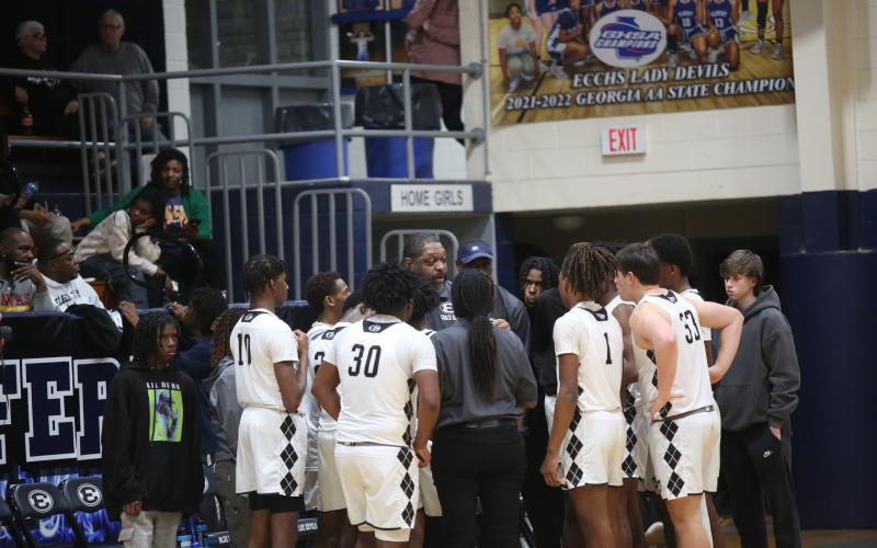 Head Coach Ed Geth makes adjustments during a timeout in Elbert's game against Rabun Jan. 27. (Photo by Wells)