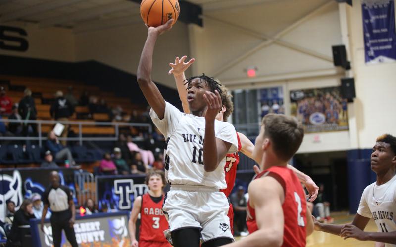 A.J. Brown floats a ball towards the basket during Elbert's loss to Rabun County Jan. 27. (Photo by Wells)