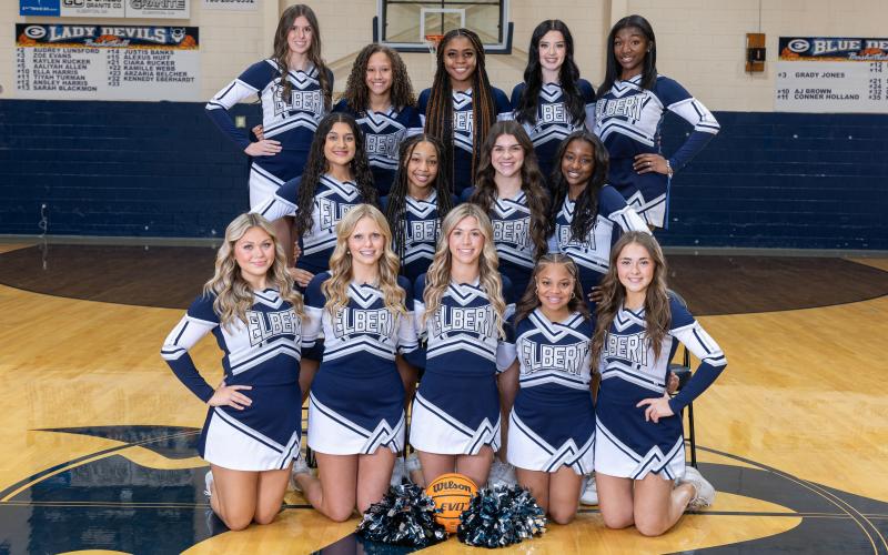 The 2024-2025 varsity basketball cheerleaders include Riyahanna Ardister, Kendall Baston, Brylie Burdette, Jennifer Flores, Kelsie Hayes, Leah Higginbotham, Jaslyn Huff, Lila Layne, Cadence Noggle, Jurnee Porter, Brailey Sims, Bailee Starrett, Ja’Nydra Watts and Ijianah Whiten. The squad is coached by Head Coach Lexi Biggs and Assistant Coach Dayna Fortson. (Photo by Mercer Harris)