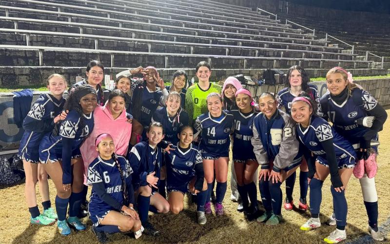 The Lady Devils soccer team poses for a team picture after dominating Jefferson County by a score of 9-0 in the Inferno Feb. 11. (Photo by Wells)