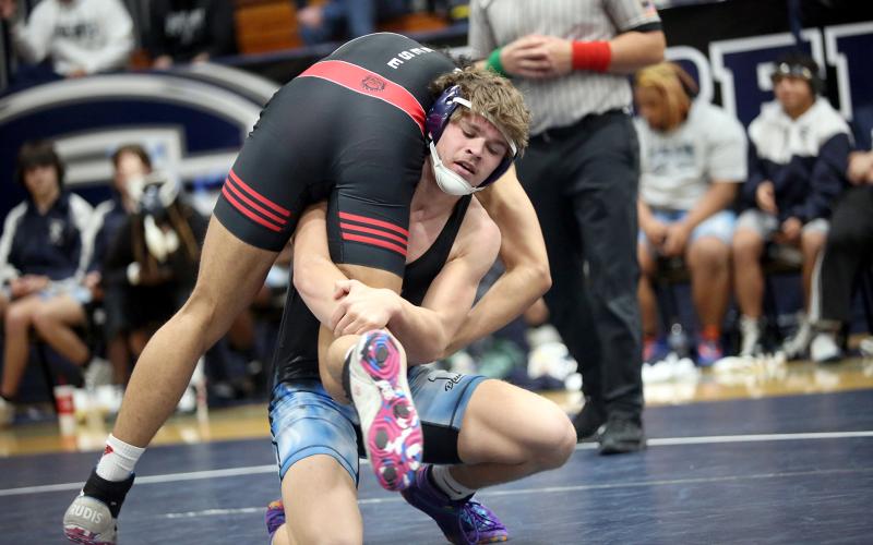 Hudson Fleming and Brycin Hughes placed in the Top 6 in the state in their respective weight classes at the GHSA Traditional State Championship Feb. 13 and Feb. 14. (File photos by Wells)