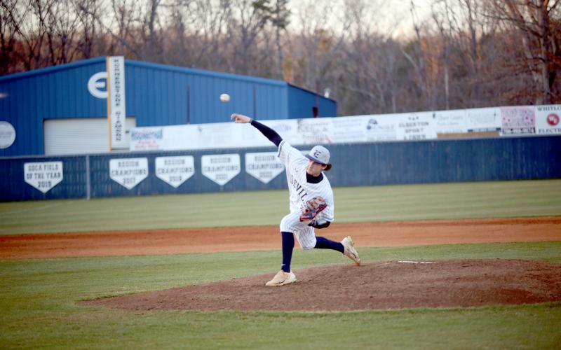 Jackson Black lets a pitch fly during Elbert’s 13-6 win over Washington-Wilkes Feb. 24. (Photo by Wells)
