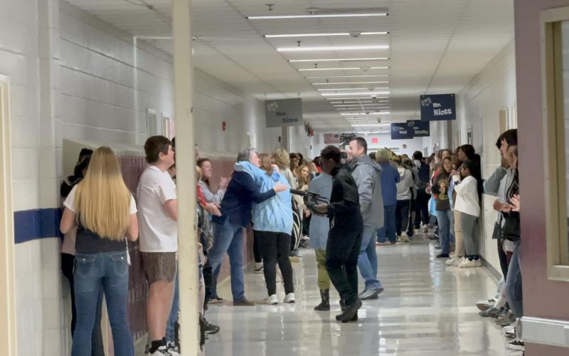 During the celebration for Marti on Jan. 15, middle school students and teachers "show Marti the love" as they wish her well after her last official day as an ECMS student.