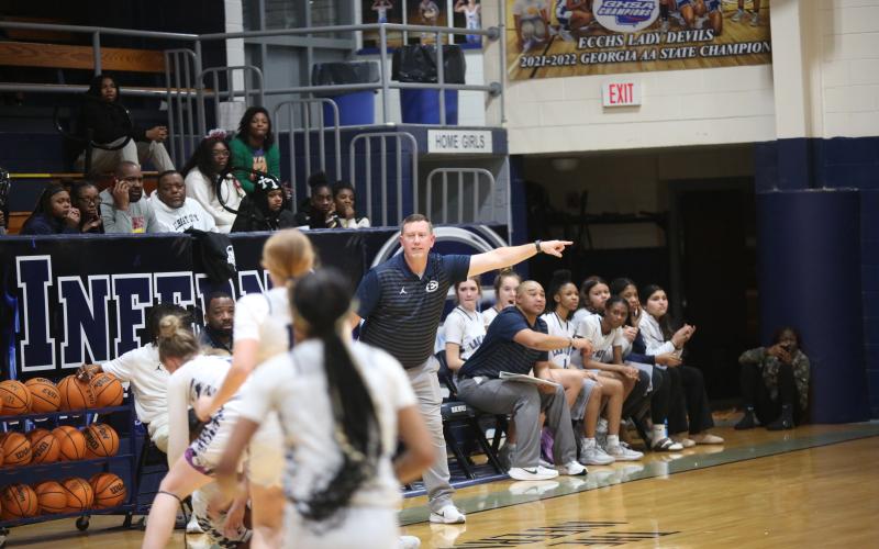 Head Coach Josh Jones (left) and Assistant Coach Sonee Bennett (right) direct traffic on the court during an Elbert game in the Inferno.