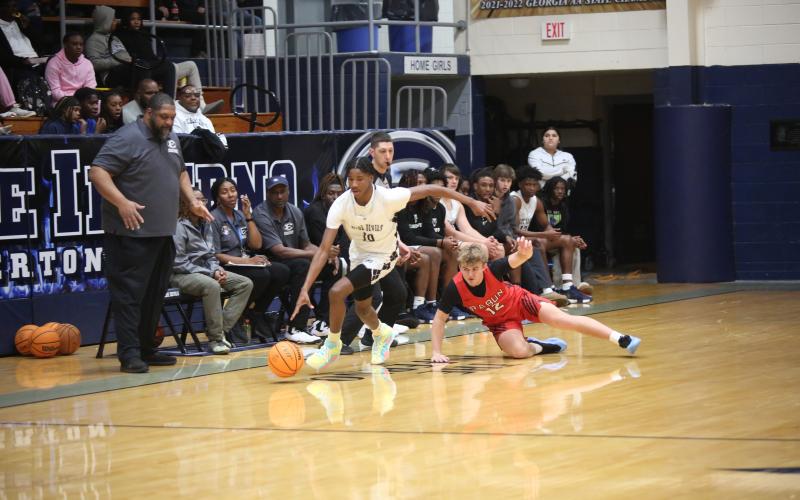 A.J. Brown blows by a defender on his way out of the back court during a game against Rabun County. (Photo by Wells)