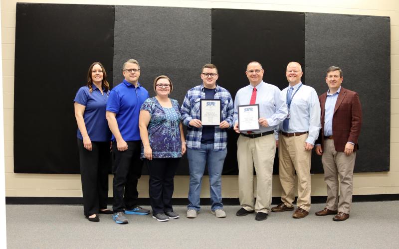 STAR Student and Teacher awards were recently presented at ECCHS. On-hand for the presentation were (L-R) Chamber of Commerce Executive Director Rebecca Long, J. Brian Williams, Lacy Williams, STAR Student Asa Williams, STAR Teacher Alton Smith, ECCHS Principal Josh Rider and Chamber of Commerce Chair Tyler Taylor. (Photo by Weeks)
