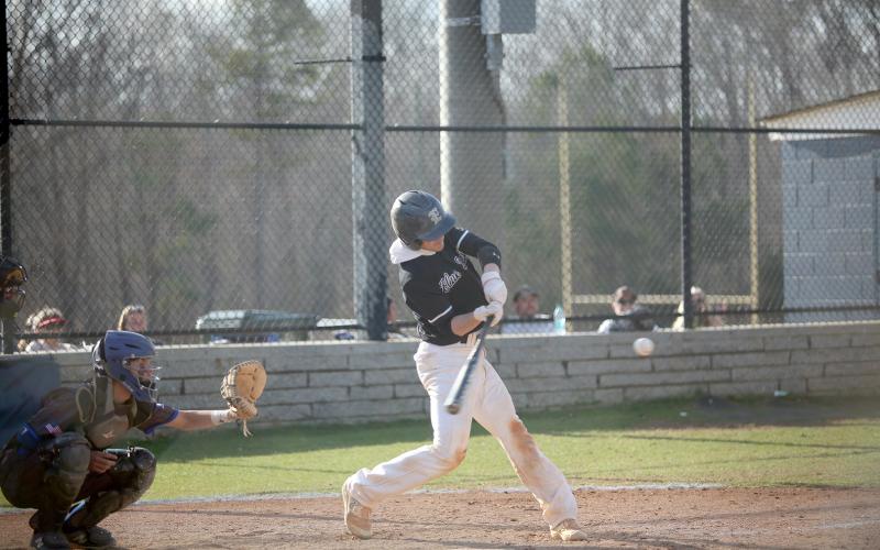Brycin Hughes gets his swing around and makes contact with the ball during the first game of Elbert’s home doubleheader against Barrow Arts and Sciences Academy March 14. (Photo by Wells)