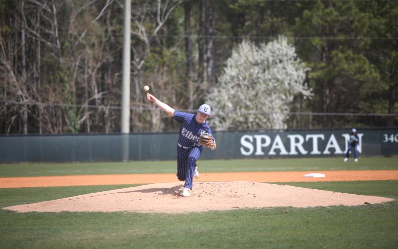 Colson Brown lets a pitch fly from the mound during Elbert’s win over Athens Academy March 8. (Photo by Wells)