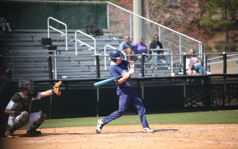 Branson Bonds powers through a pitch for a base hit during the win over Athens Academy. (Photo by Wells)