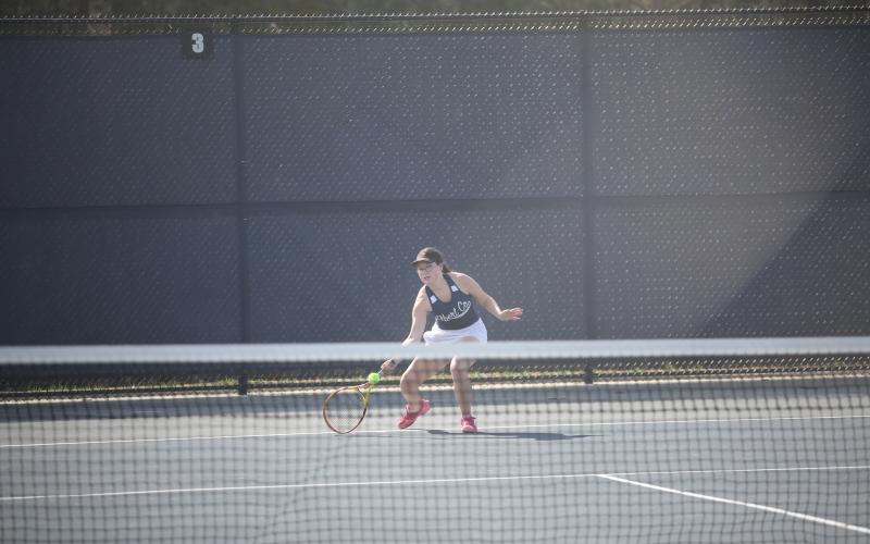 Gracie Kidd reaches for a forehand shot during Elbert’s home match against Rabun County March 19. (Photo by Wells)
