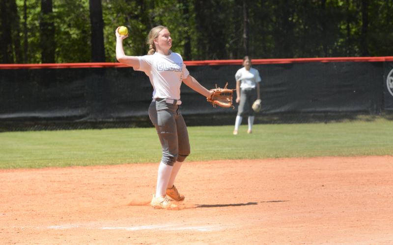 Audrey Lunsford throws over to first base from the shortstop position. (Photo by Benjamin London - The Hartwell Sun)