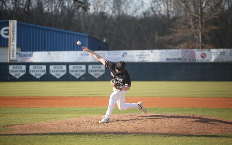 Colson Brown lets a pitch fly from the mound during a game against Barrow Arts and Sciences Academy March 14. Brown and the Diamond Devils are scheduled to see ACE Charter in the first round of the GHSA State Playoffs April 25. (File photo by Wells)