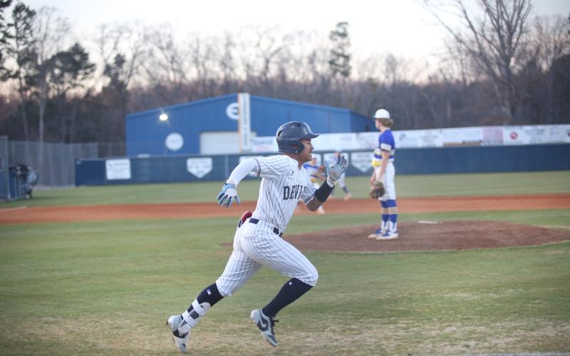 Jose Rodriguez sprits down the basepath during a win over Washington-Wilkes. (Photo by Wells)