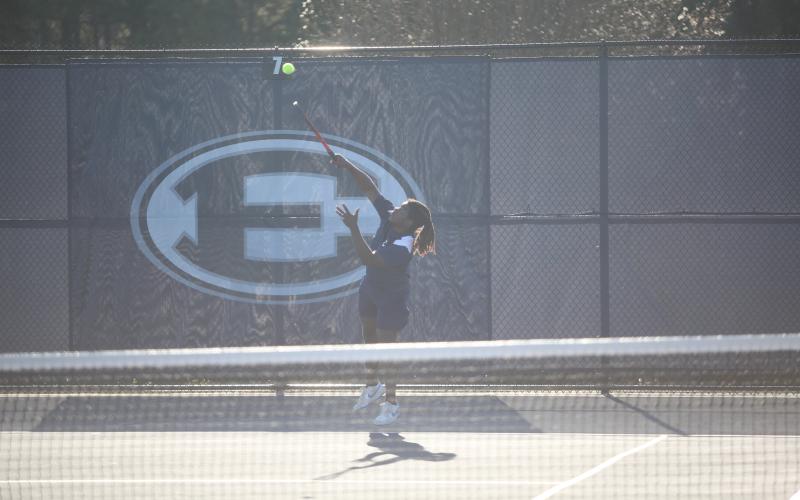 Jasean Jenkins serves the ball during a match against Washington-Wilkes. (Photo by Wells)