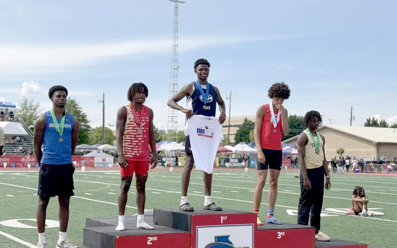 Elbert County track athlete D.K. Winn won a state championship for triple jump during the GHSA State Track Meet in Rome May 9. Winn jumped a distance of 46 feet, 11.5 inches, beating the second place athlete by a total of 10 inches. (Photo courtesy of ECCHS Athletics)