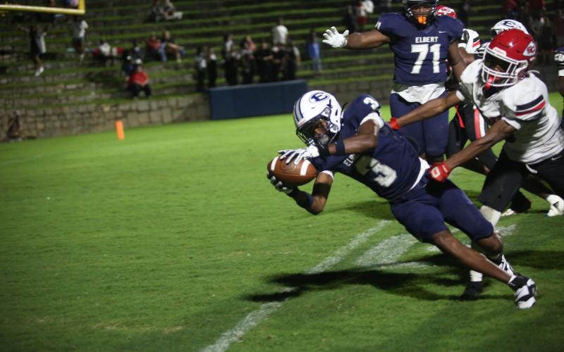 Senior wideout D.K. Winn reaches for the goal line and scores during Elbert County's 21-17 loss to Stephens County on August 21. (Photo by Bo Underwood)