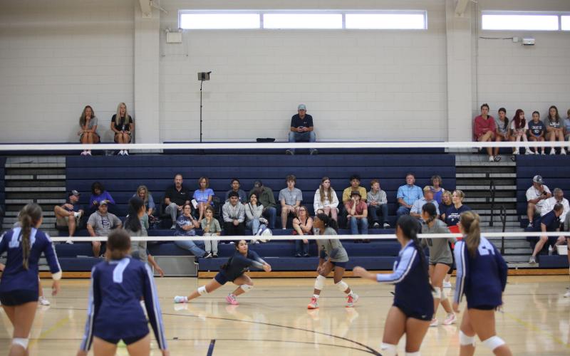 Freshman libero Sophia Vargas dives to save the ball in Elbert County's Aug. 7 match against Johnson. (Photo by Bo Underwood)