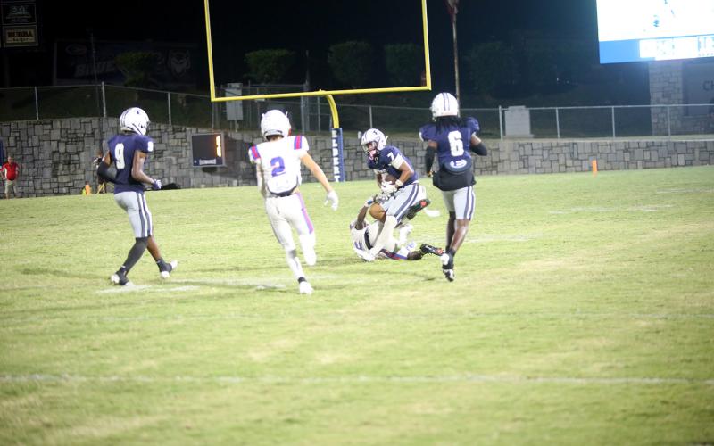 No. 7 Jose Rodriguez intercepts a pass against Oglethorpe on Sept. 19. (Photo by Bo Underwood)