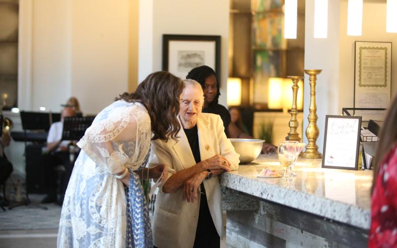 The City of Elberton hosted a gala at the Samuel Elbert Hotel to celebrate the 100th anniversary of the historic Elberton hotel. The event celebrated the anniversary with food, live music and a presentation from local historian Joyce Davis (above left) about the hotel's history. (Photo by Mark Wells)