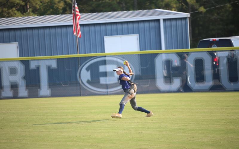 Bellamy Nash hurls the ball from the outfield against Commerce on Sept. 18.  (Photo by Bo Underwood)