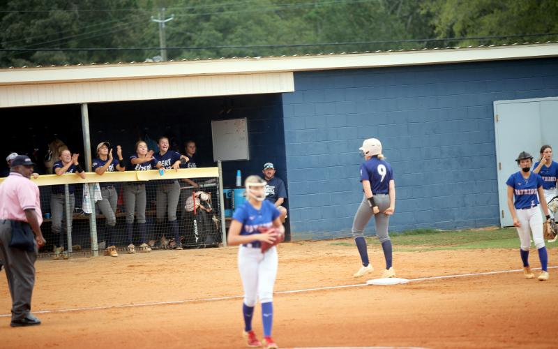 Audrey Lunsford (9) celebrates a triple against Oglethorpe. (Photo by Bo Underwood)
