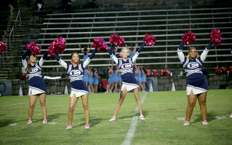 Elbert County cheerleaders sport pink pom-poms to commemorate breast cancer awareness month. (Photo by Bo Underwood)