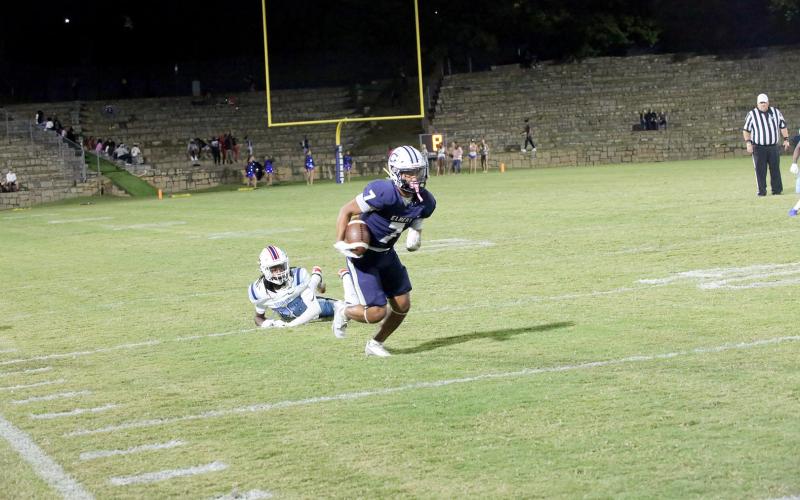 Jose Rodriguez (7) leaves a defender in the dust against PCA on Oct. 3. (Photo by Bo Underwood)