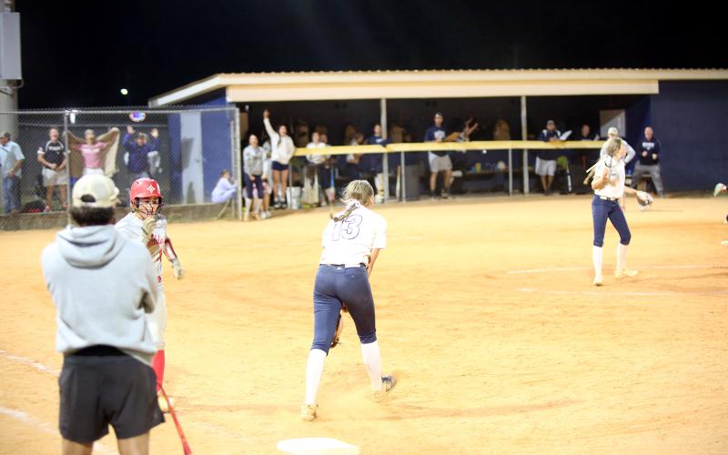 Bryleigh Dickerson (13) celebrates after the last out of Elbert's 10-9 victory over Thomasville on Oct. 22. (Photo by Bo Underwood)