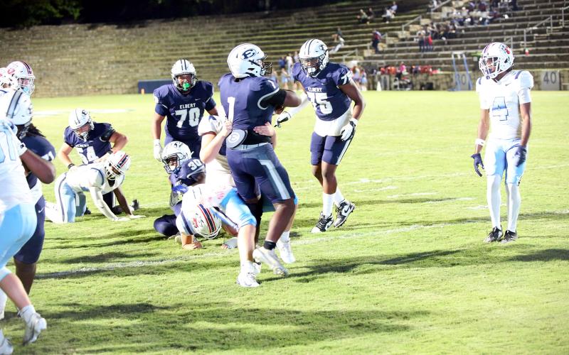 Reunte Tucker (1) barrels into the end zone in Elbert’s 43-9 win over Providence Christian. (Photos by Bo Underwood)