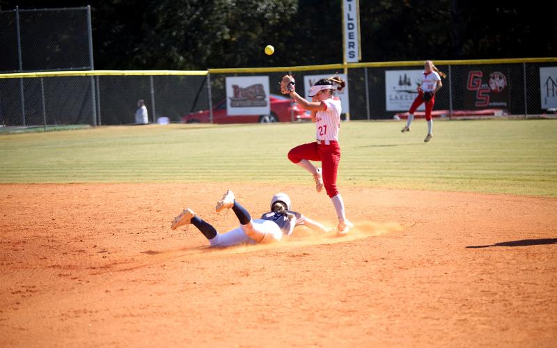 Audrey Lunsford (9) slides into second base. (Photo by Bo Underwood)