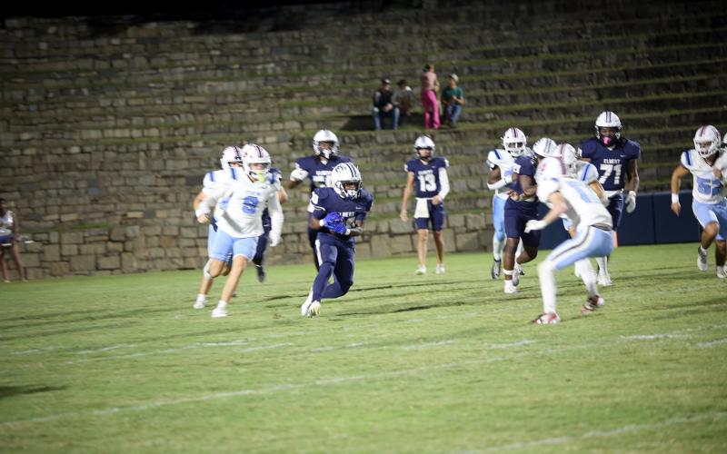 Petey Allen (30) readies for contact in Elbert’s 43-9 win over Providence Christian. (Photo by Bo Underwood)