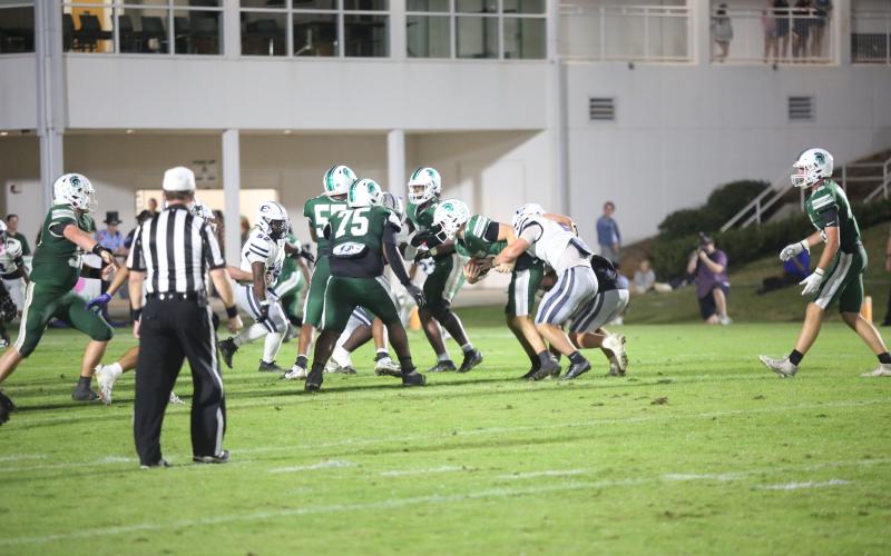 Lincoln Blackmon (2) sacks the quarterback in Elbert County's 48-14 loss to Athens Academy on Oct. 17. (Photo by Bo Underwood)