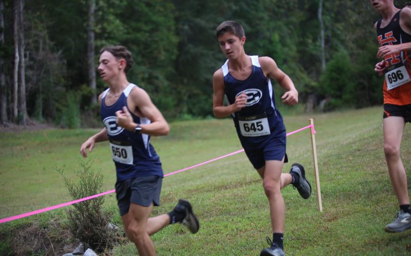 Dakota Toole (left) and Eli Alexander (right) were among Elbert’s top finishes in the team’s win at The Reservation Run on Oct. 2. (File photos by Bo Underwood)