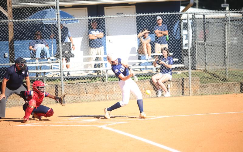 Audrey Lunsford hits the ball  in Elbert’s sweep over Putnam County on Oct. 15. (Photo by Bo Underwood)