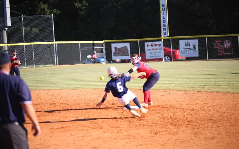 Bellamy Nash (5) slides into second base in Elbert’s sweep over Putnam County on Oct. 15. (Photo by Bo Underwood)