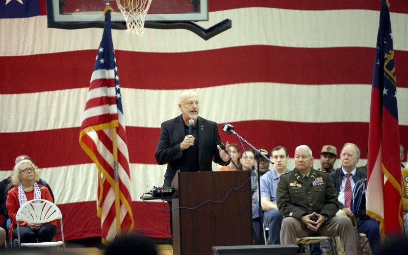 Guest speaker Lt. Col Jeff Carlyle addresses the crowd at ECCHS' annual Veteran's Day program. (Photo by Bo Underwood)