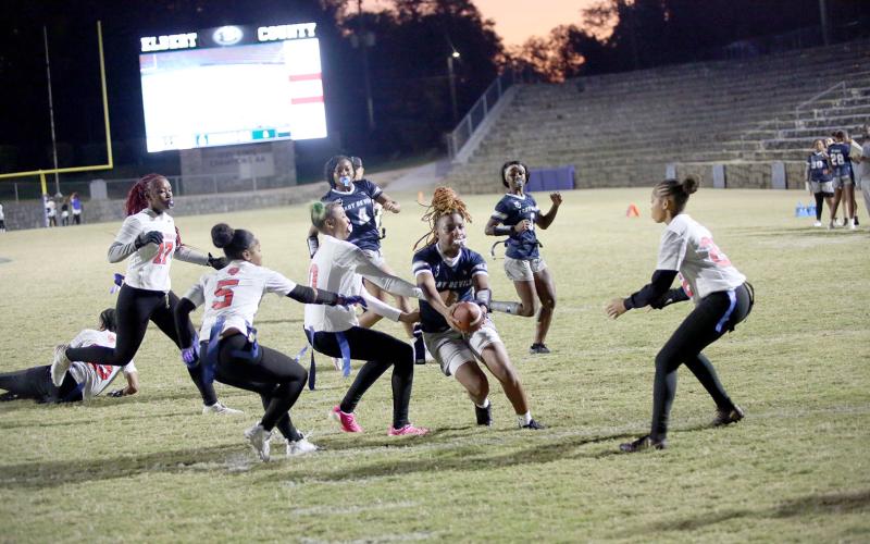 Zoe Evans (3) reaches the ball over the goal line for a touchdown against Cedar Shoals. (Photo by Bo Underwood)
