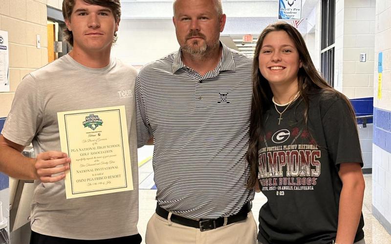 Larry Kesler (middle) poses after qualifying for nationals in Frisco, Texas.