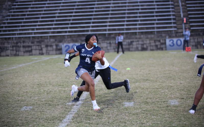 Kaylen Rucker (4) carries the ball against Cedar Shoals on Nov. 5. (Photo by Bo Underwood)