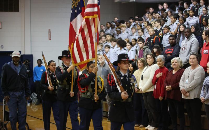 JROTC cadets present colors at ECCHS' annual Veteran's Day program. (Photo by Bo Underwood)