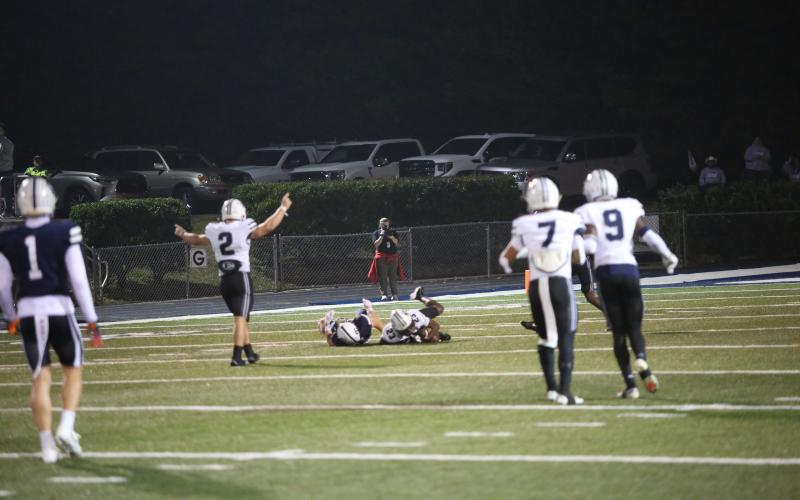 Lincoln Blackmon (2) celebrates an interception by Runt Mattox (23). (Photo by Bo Underwood)