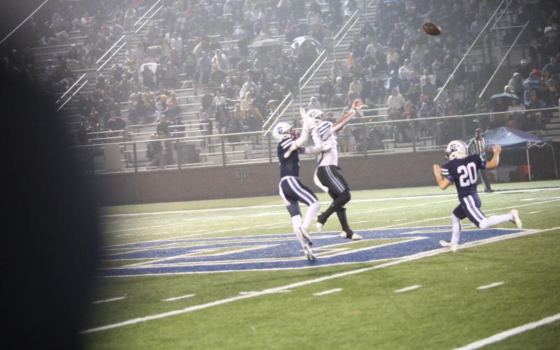 Jose Rodriguez jumps up to catch a deep pass. (Photo by Bo Underwood)