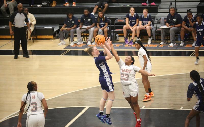 Audrey Lunsford pulls up and lets a mid-range jumper fly. (File photo by Mark Wells)