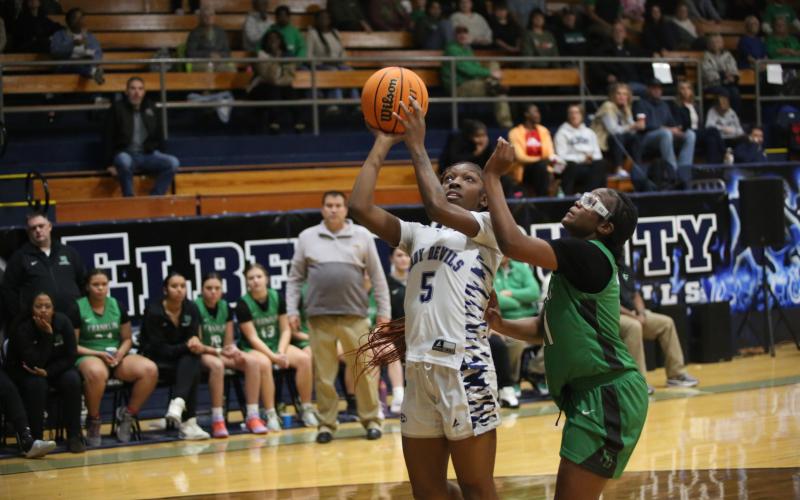 Aaliyah Allen goes up for a shot against Franklin on Dec. 9. (Photo by Bo Underwood)