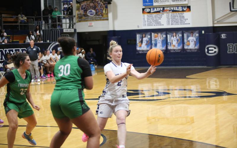 Audrey Lunsford passes the ball against Franklin on Dec. 9. (Photo by Bo Underwood)