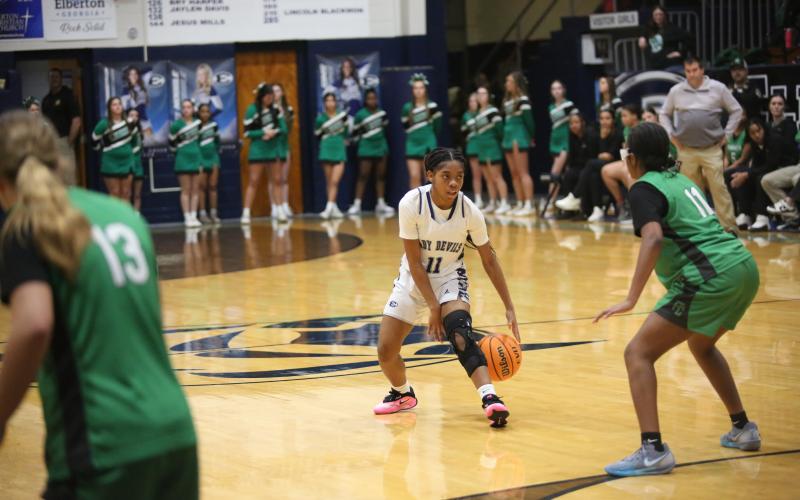 Tiyah Turman dribbles against Franklin on Dec. 9. (Photo by Bo Underwood)