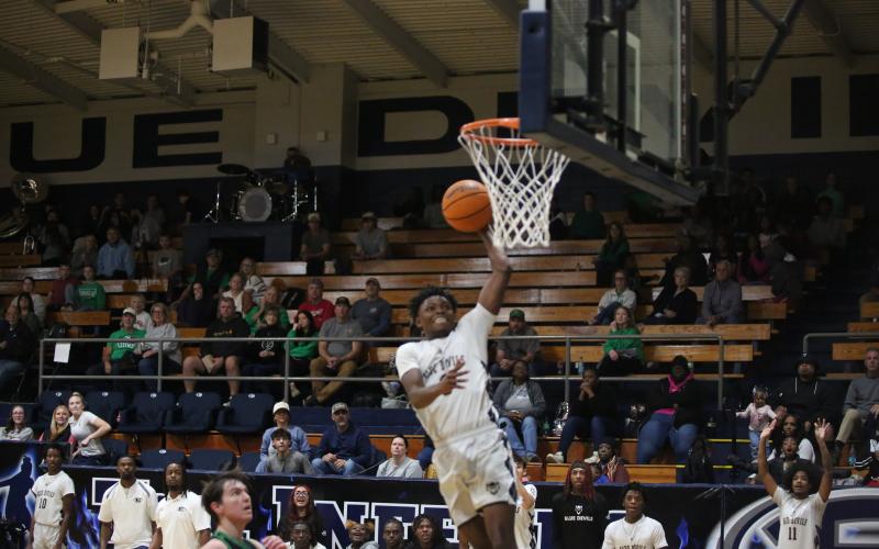 D.K. Winn goes up for a dunk. (Photo by Bo Underwood)